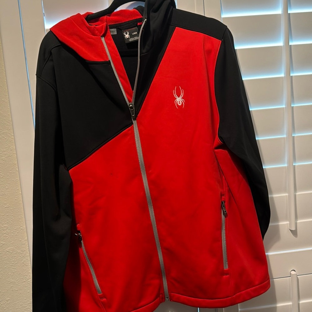 Spyder Jacket- felt lining, zippered pockets, felt lined hood.